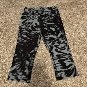 Nike gray and black athletic capris.